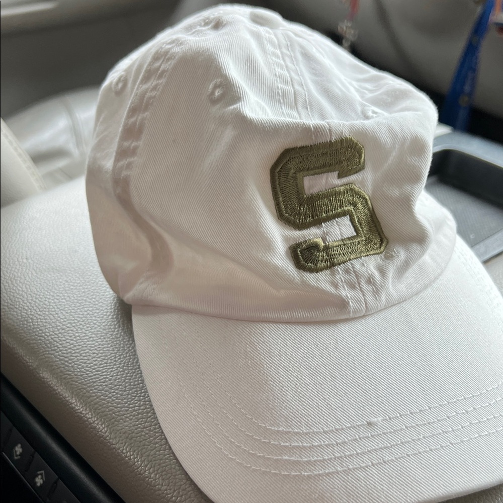 White Cap with Gold Lettering